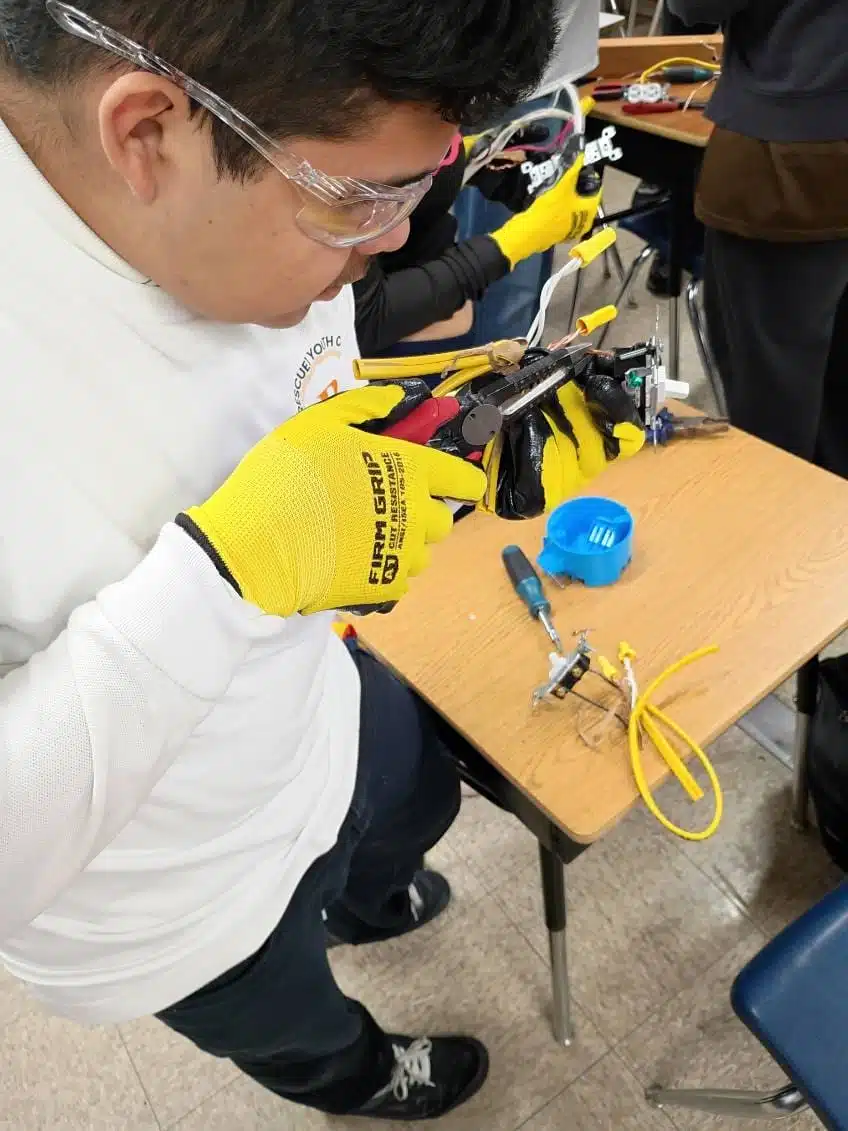 R1YC participants taking part in a hands-on learning experience